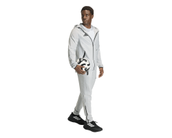 ADIDAS TIRO TRAVEL WINDBREAKER - TMLGGR/BLACK