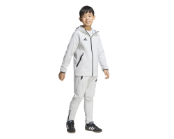 ADIDAS TIRO TRAVEL WINDBREAKER JR. - TMLGGR/BLACK
