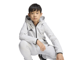 ADIDAS TIRO TRAVEL WINDBREAKER JR. - TMLGGR/BLACK